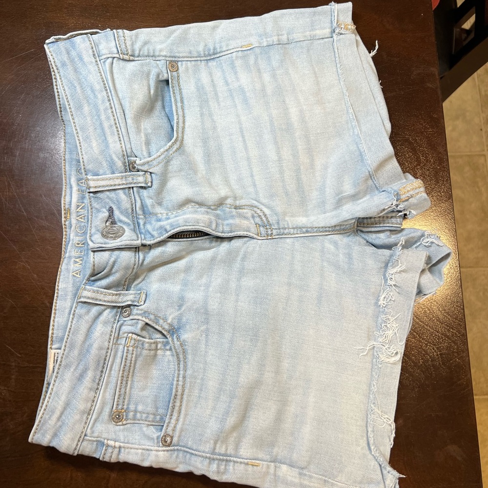 American eagle light wash high waisted denim shorts, size 8 next level stretch